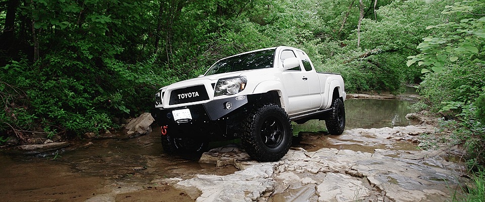 2016_toyota_tacoma_white_in_river_960x400